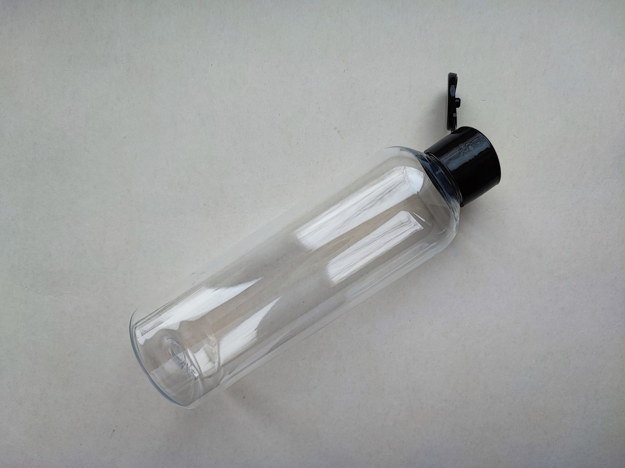 200 - 205 мл 24/410 ПЕТ флакон Круглий прозорий з кришкою чорною фліп-топ 24 мм, пляшка, пластикова, пластмасова