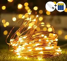 Світлодіодна гірлянда нитка Роса на батарейках 10 м, Гірлянда роса 100 Led 10 м на батарейках теплий жовтий