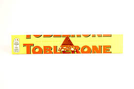 Молочний шоколад з медом та мигдалем Toblerone 100g (Швейцарія)