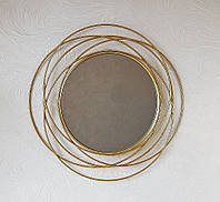 Настенное зеркало круглое из стекла и металла с золотой рамой 91075