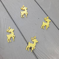 Олень із фетру з блискітками золотий.