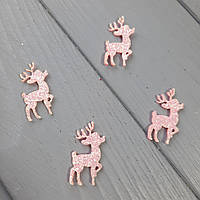 Олень із фетру з блискітками рожевий.