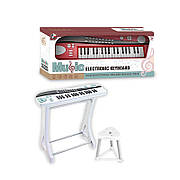 Синтезатор дитячий піаніно 660-11/12  на батарейках,  На ніжках, зі стільчиком, два кольори мікс,  короб. 60*25*12см