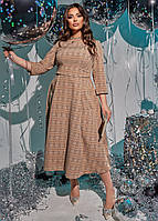 Жіноча лаконічна сукня міді в клітку