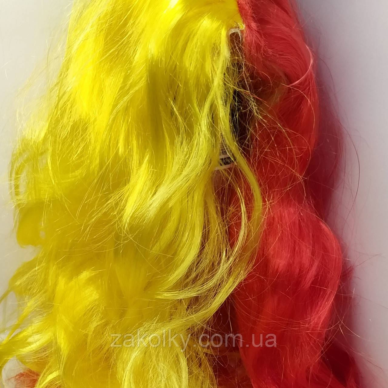 Перука на голову жовто-червоний.