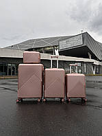 Середня (M) валіза Wings Dove WN01 Рожеве золото