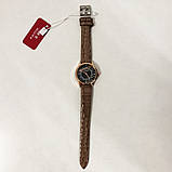 Стильні бежеві наручні годинники жіночі. З блискучому ремінцем. В чохлі. CJ-702 модель 78464, фото 4