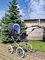 Детская коляска-трансформер с регулируемой ручкой Eichhorn Черно-голубая ( 419RFS-S021-EVA-STN)