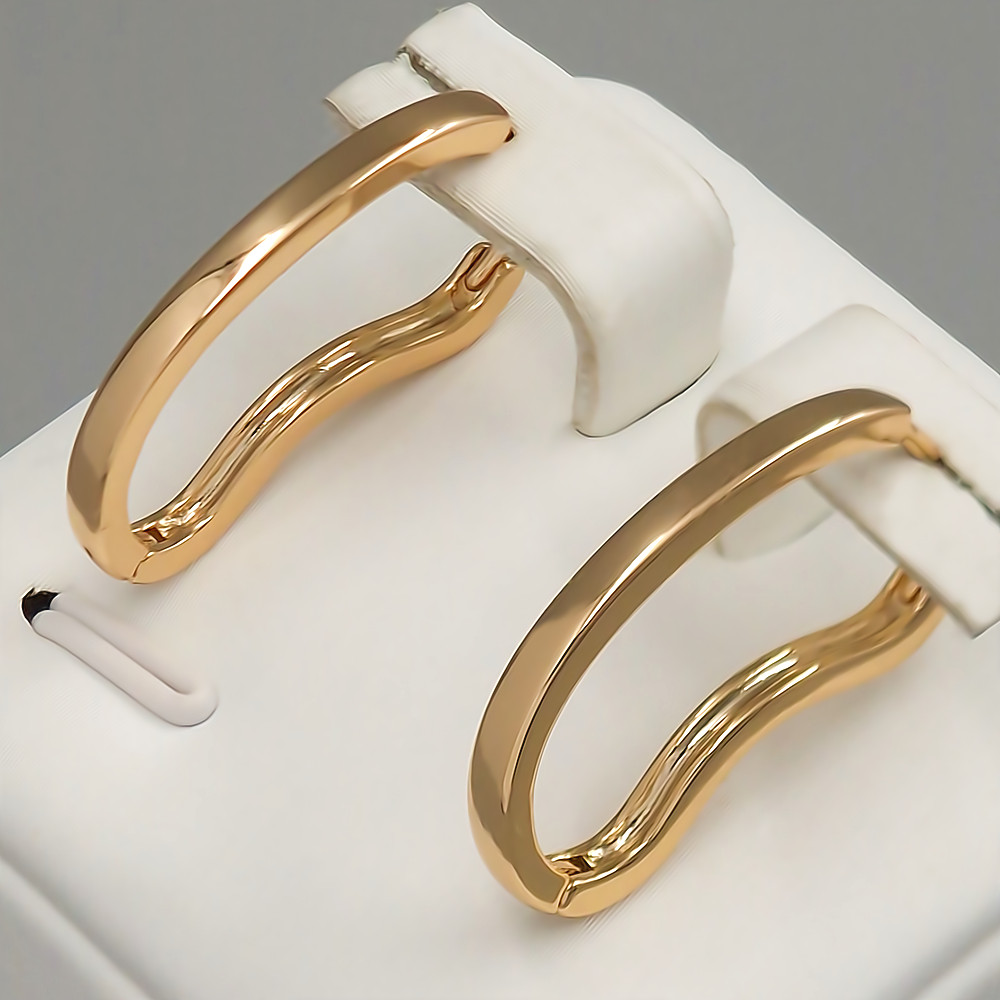 Сережки ХР. Позолота 18К. Довжина: 25 мм. Ширина: 2 мм.