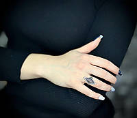 Женское серебряное кольцо с кубическим цирконием черненое