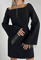 Черное женское вечернее платье полу-прилегающего силуэта из креп-костюмки с металлической бахромой
