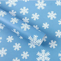 Пакувальний папір 0,7*1 м Сніжинки на блакитному