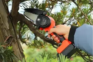 Міні пила Mini Electric Chain Saw у валізі для обрізання дерев та розпилу дров 24V Помаранчева YU227