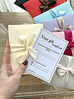 Подарункові сертифікати у конвертах зі стрічкою