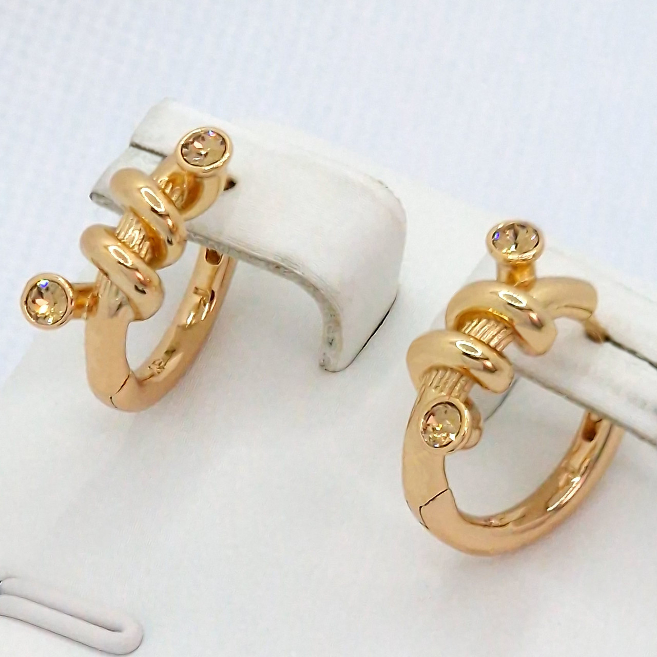 Сережки ХР. Позолота 18К. Камені: жовтий циркон. Діаметр: 18 см. Ширина: 5 мм.