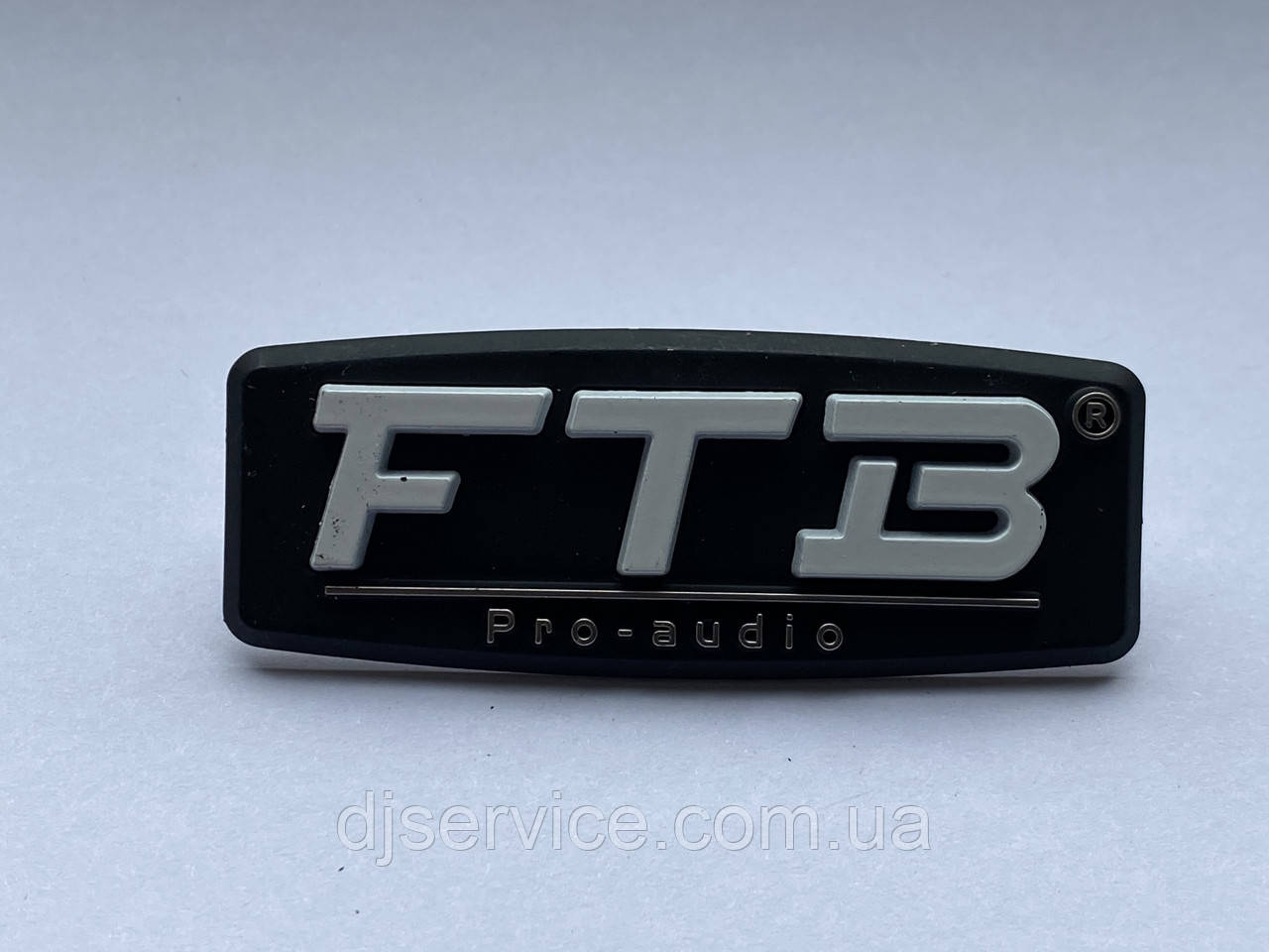 Шильдик, наклейка, логотип (metall) 70x30 mm 1 шт. на сітку колонки FBT