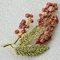 Брошка металева на золотистій основі гілочка з кристалами покрита кольоровою емаллю розмір виробу 60х35 мм