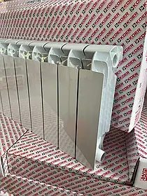 Koer Maxi биметалл 350*120 Двутрубный