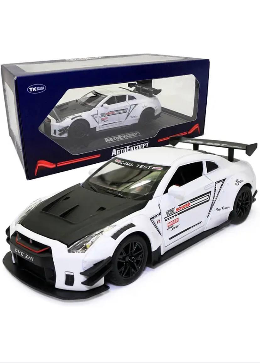 Машинка металева Nissan GT-R «АвтоЕксперт» Ніссан ГТ-Р білий звук світло 20*6*9 см, фото 1