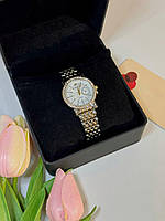 Стильний годинник жіночий наручний кварцовий колір сріблястий із золотистими домішками в подарунковій скриньці