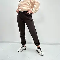Жіночі спортивні штани на флісі на гумці з кишенями