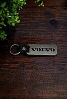 Брелок с метала и названием марки VOLVO
