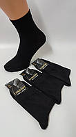 Шкарпетки чоловічі Nadin 10115 Comfort вис. стрейч чорні р.41-45 (уп.12 пар)