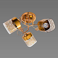 Потолочная люстра в золотом цвете с тремя стеклянными плафонами под лампы Е27 Sirius Ю 6757А/3 FG