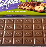 Молочний шоколад Milka Nutty Choco Wafer горіховий з шоколадною вафелькою 270 грам, фото 4