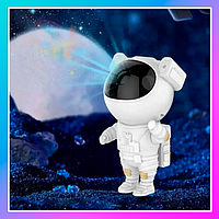 Лазерний нічник-проєктор зоряного неба астронавт, світильник дитячий проєктор космонавт із пультом