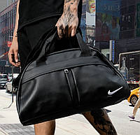 Спортивна сумка груша Nike чорна шкірозамінник є ручки і ремінь через плече