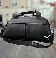 Спортивна сумка груша Puma чорна з білим лого шкірзам є ручки та ремінь через плече