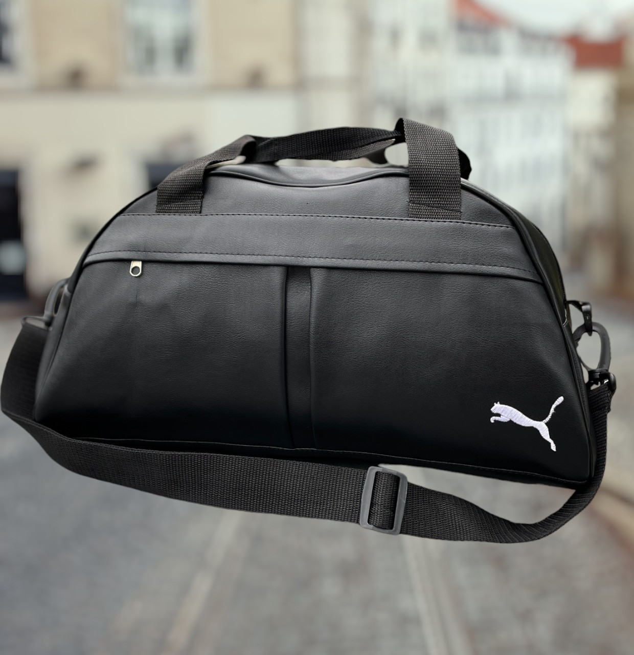 Спортивна сумка груша Puma чорна з білим лого шкірзам є ручки та ремінь через плече