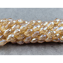 Намистини Скло овал 6*8мм, шампанське