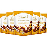 Шоколадные шарики Lindt Crispy Sensation Milk Chocolate Corn 140г (ТЕРМІН ДО 03.2024), фото 3