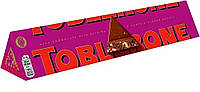 Шоколад Швейцарский Молочный Toblerone с изюмом, медом и миндальной нугой