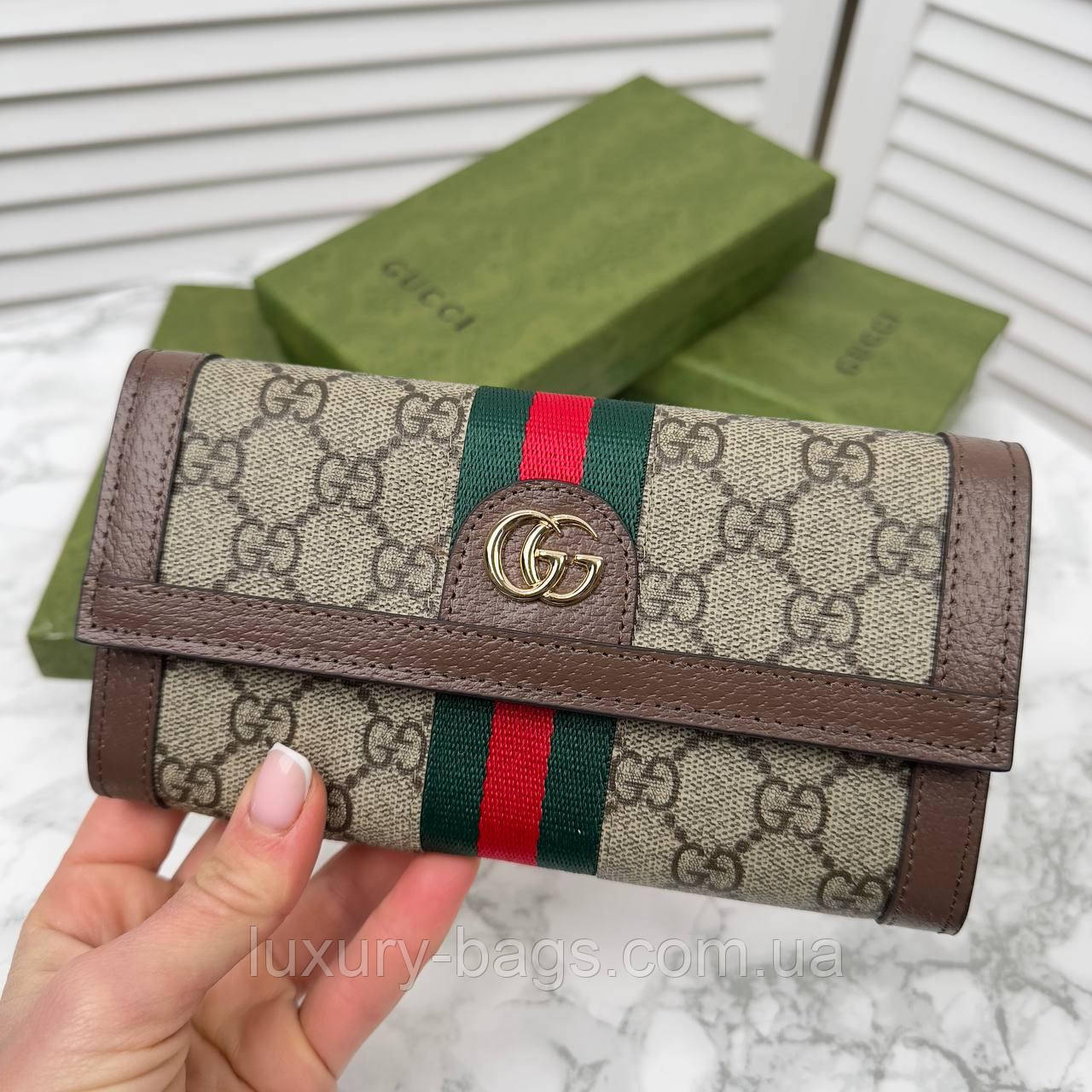 Жіночий гаманець на кнопці Gucci