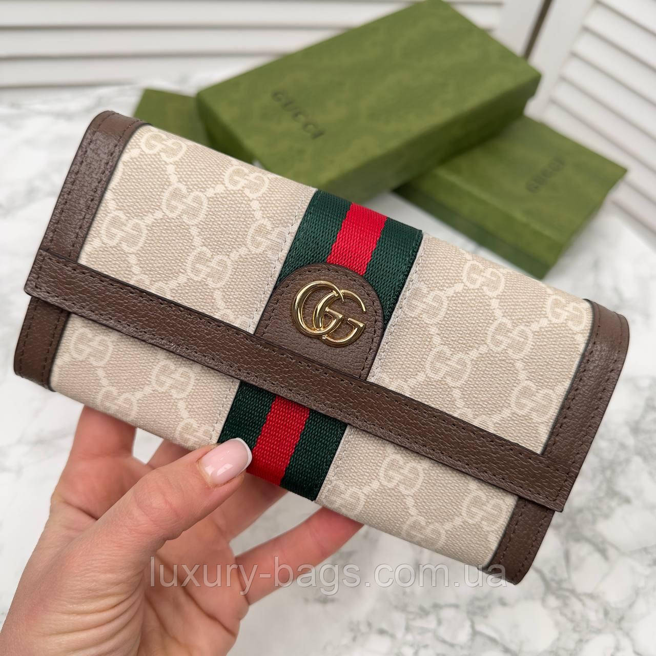 Жіночий мініатюрний гаманець на кнопці Gucci