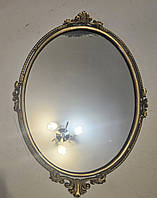 Антикварне дзеркало в бронзовій рамі