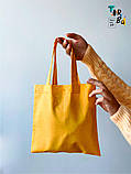 Маленька торба з тонкого котону жовтого кольору без друку Розмір: 20cм х 20см, фото 5