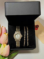 Годинник жіночий наручний кварцовий колір золотистий у комплекті з браслетами 2 шт. декор блискучих каменів