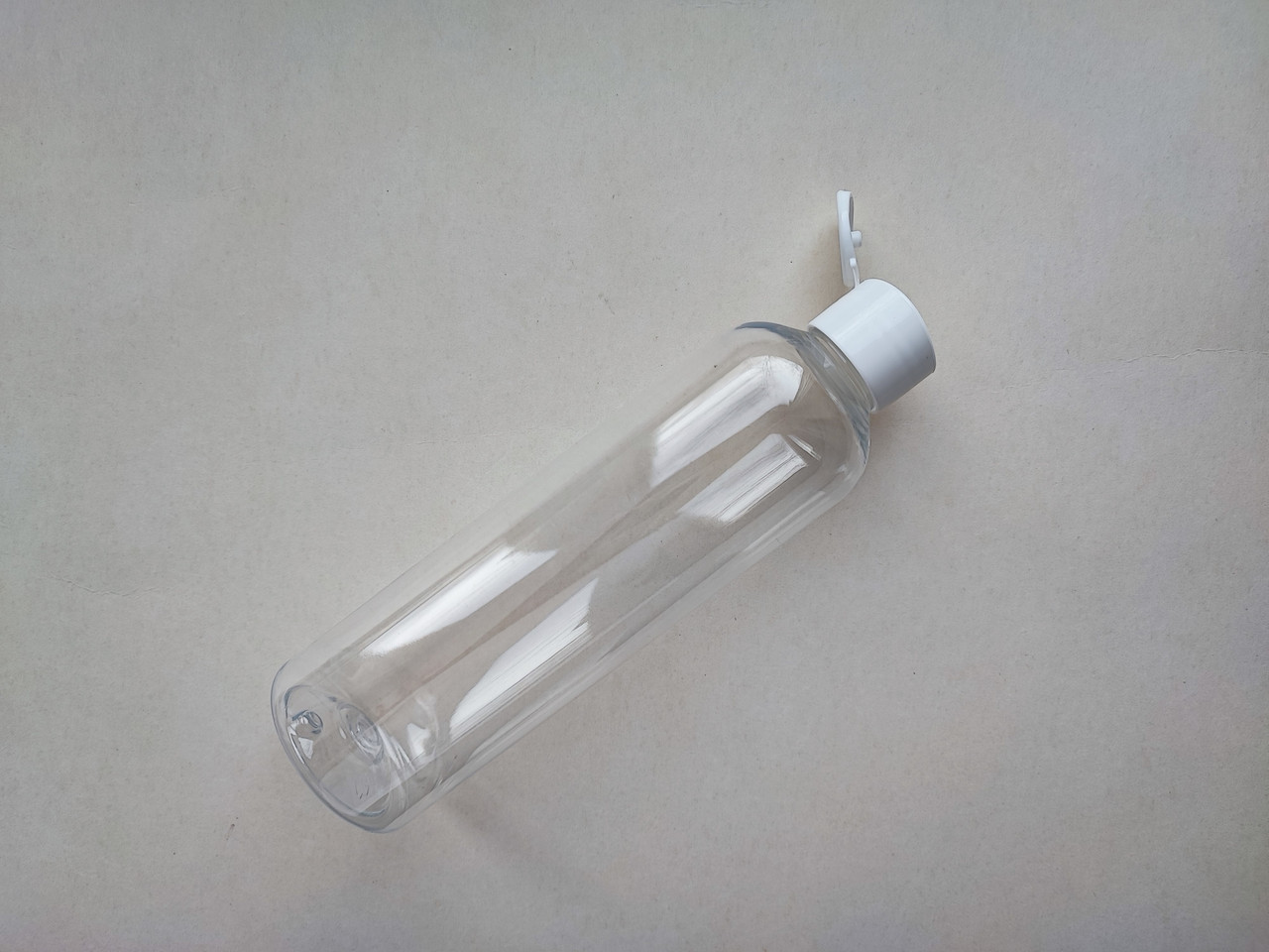 250 мл ПЕТ флакон Круглий прозорий з кришкою білою фліп-топ 24 мм, пластиковий, пластмасовий пляшка