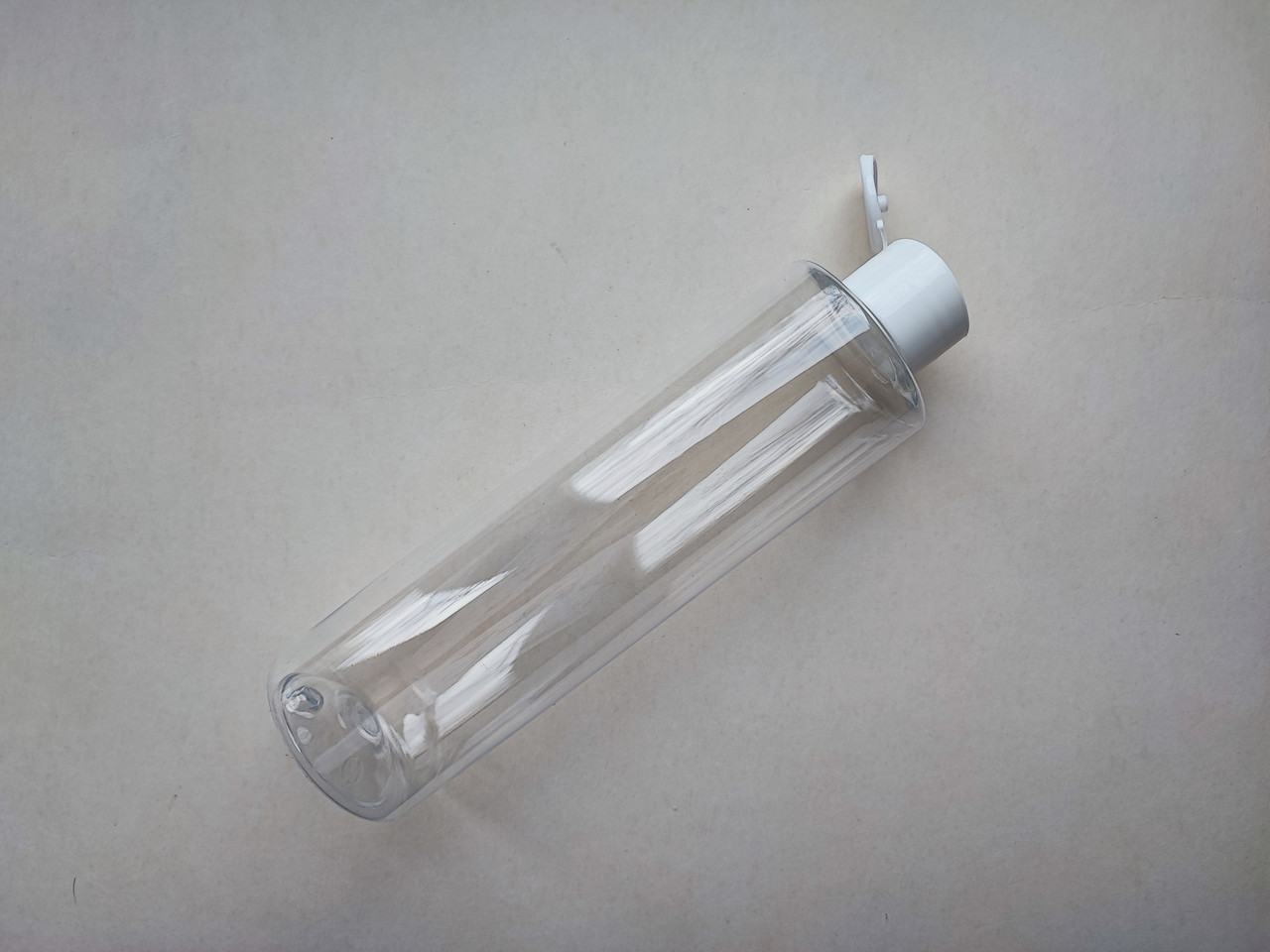 250 мл ПЕТ флакон Циліндр прозорий з кришкою білою фліп-топ 24 мм, пластиковий, пластмасовий пляшка