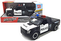 Іграшкова поліцейська машина з великими колесами пікап Ford зі звуками та світлом на батарейках