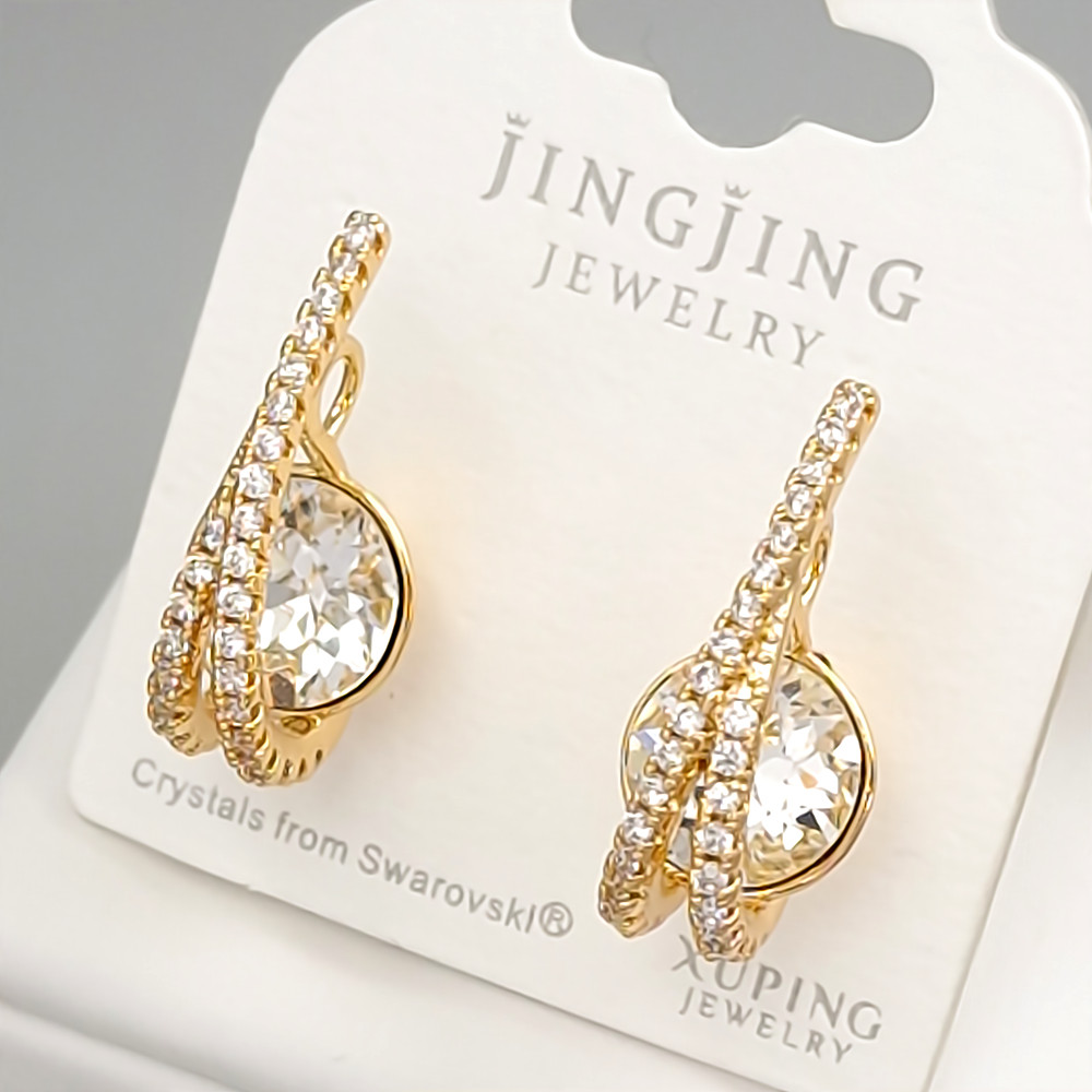 Сережки XР. Позолота 18К. Камені: Swarovski і білий циркон. Довжина: 20 мм. Ширина: 9 мм.