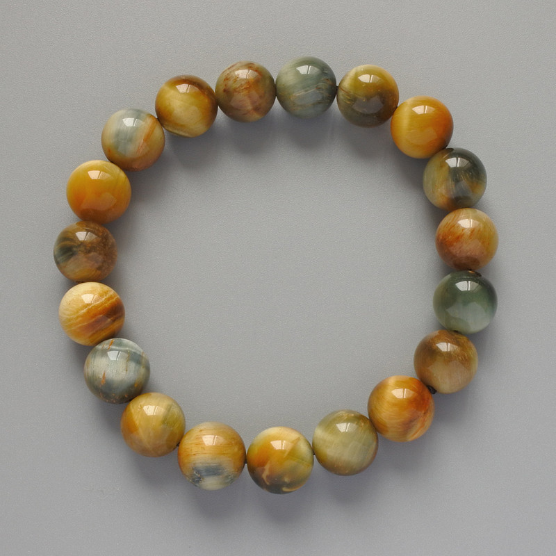 Браслет Жовто-сіре Котяче Око натуральний камінь гладка кулька d-10,5мм+- L-18см+- (стрейч) купити біжутерію дешево оптом в