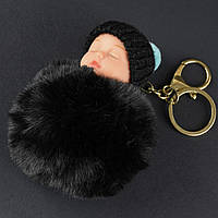 Брелок м'який застібка золотистого кольору з карабіном плюшевий чорного кольору лялька розмір 8х8 см