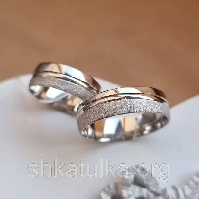 Срібні каблучки з орнаментом пара