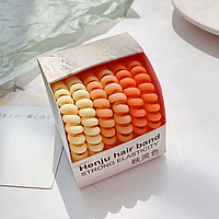 Набір повнорозмірних матових резинок-пружинок в коробці (відтінки оранжевого)