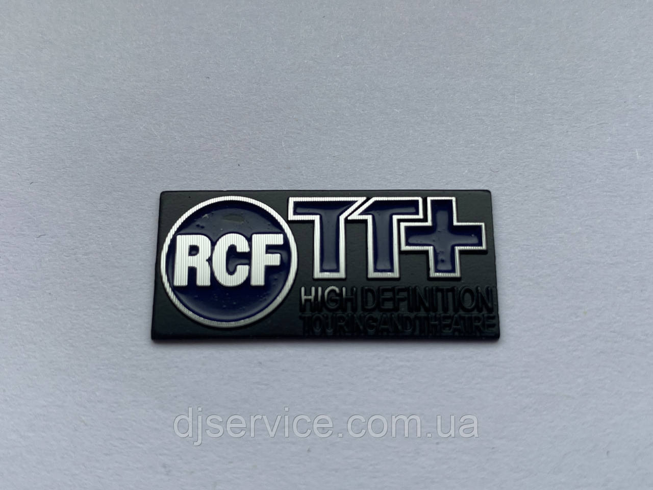 Шильдик 31x14mm (metall) на сітку колонки RCF
